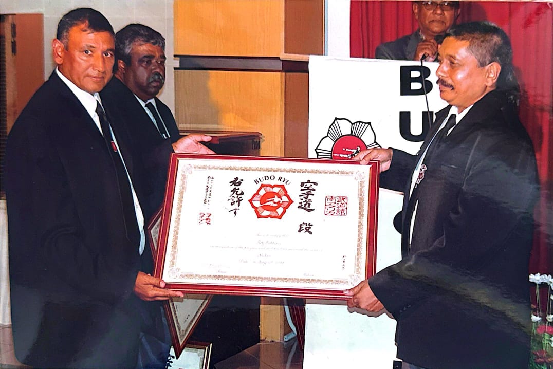 Presentation of a framed Budo Ryu karate dan grade certificate at an S.A. Budo Ryu ceremony in Durban
